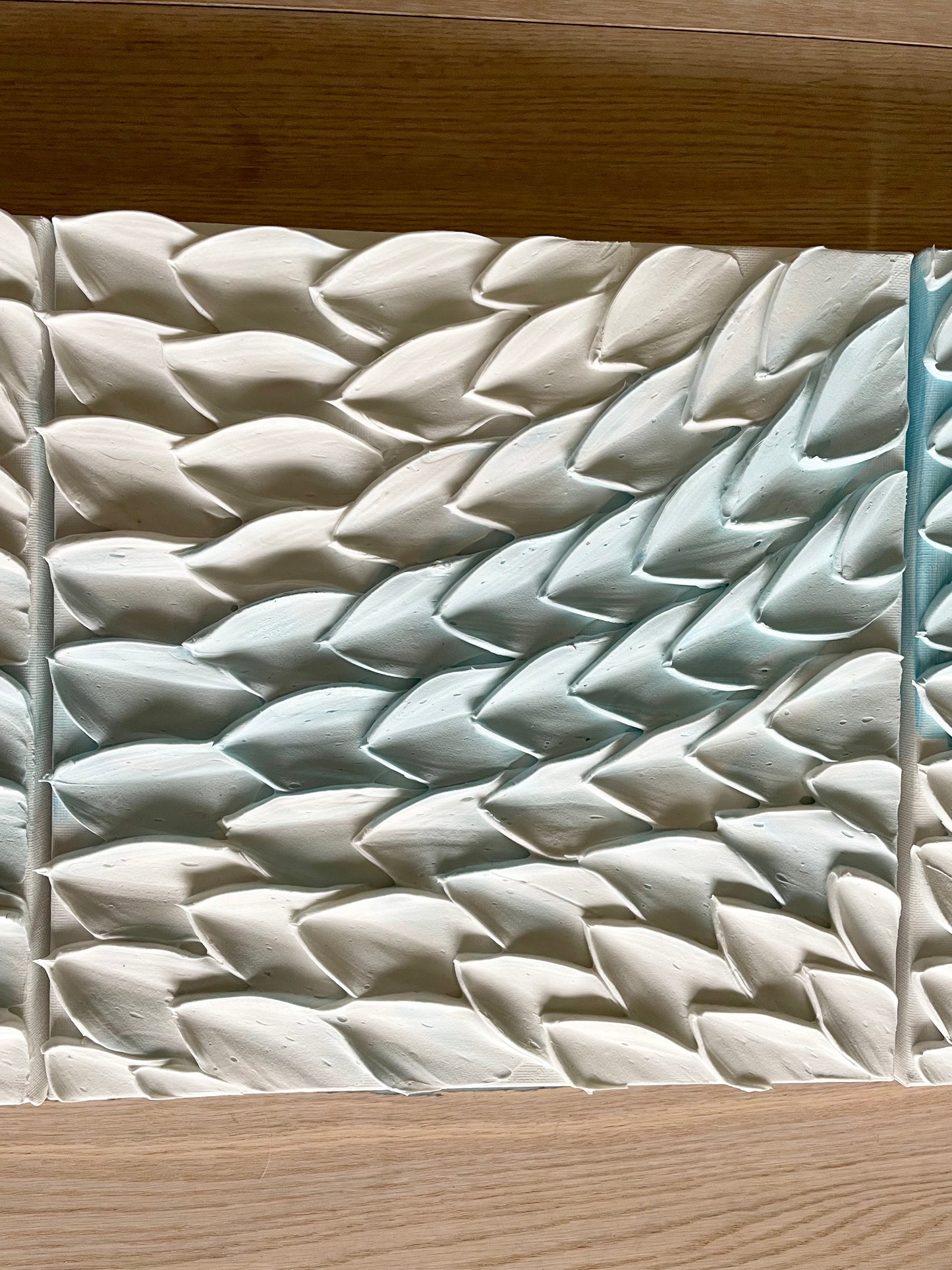 Light blue waved canvas artwork - Flexured