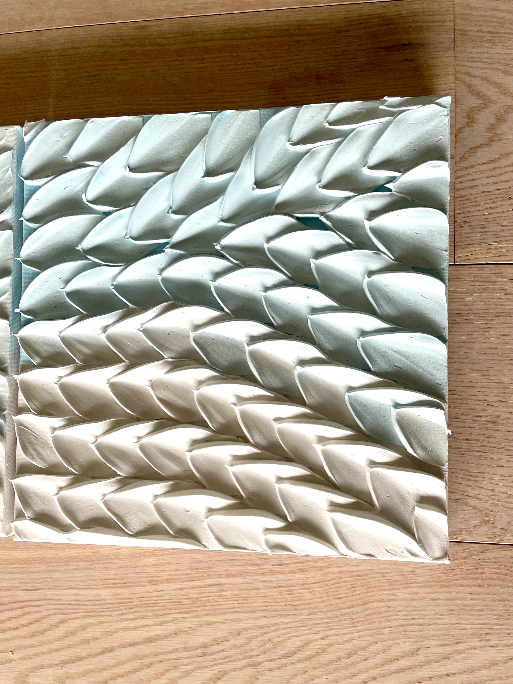 Light blue waved canvas artwork - Flexured